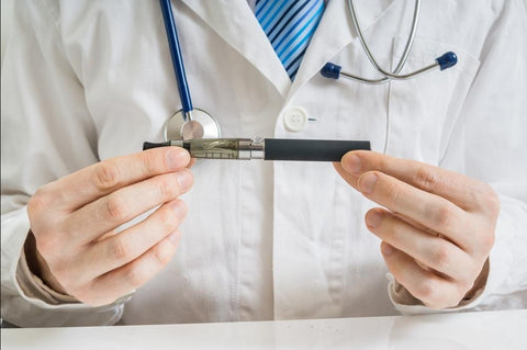 doctor holding vape